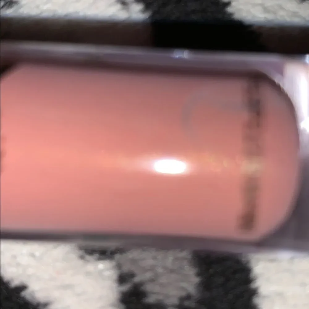Nude color lip gloss